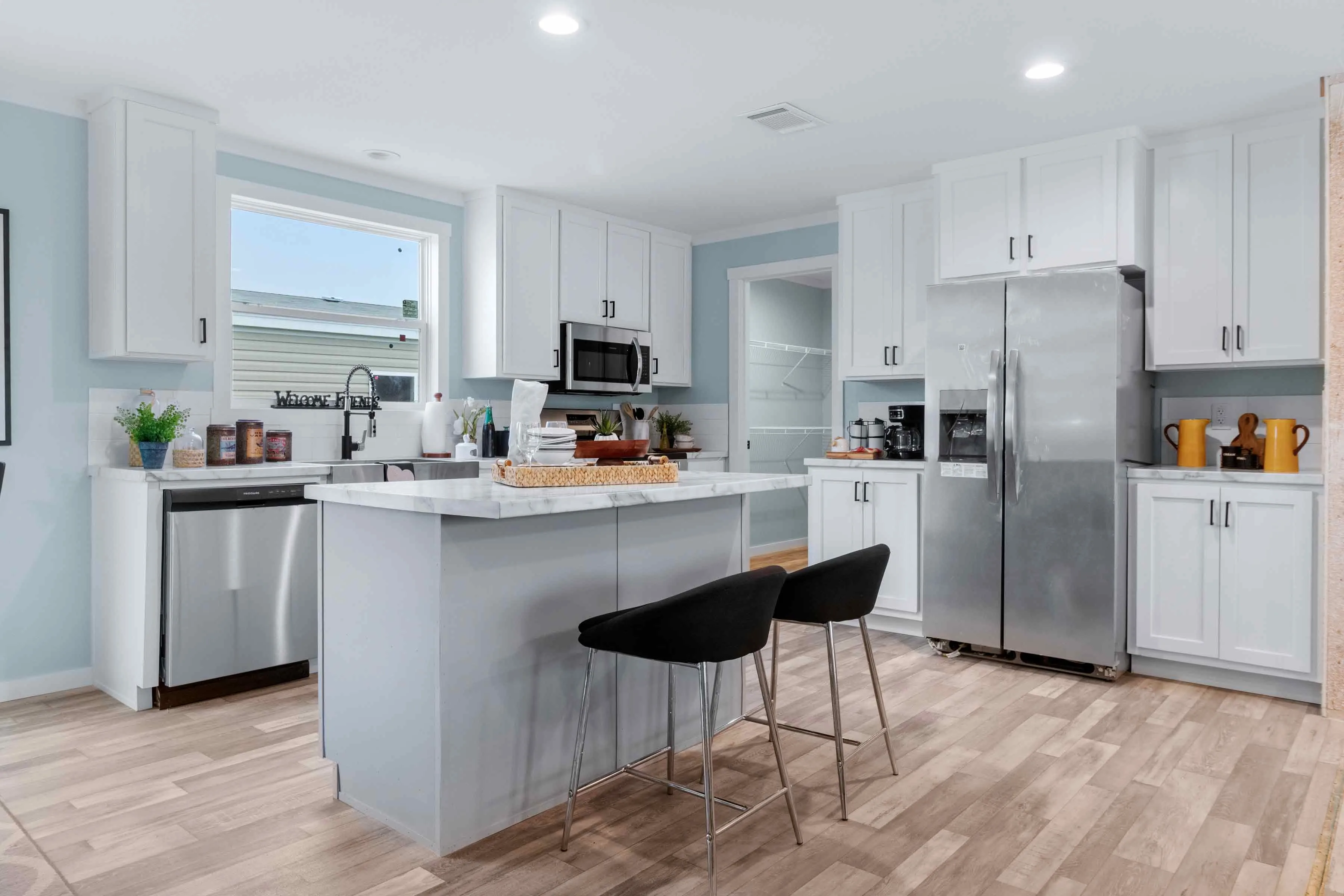 modern manufactured homes Texas with open concept kitchens and large island Marathon Homes Breckenridge TX