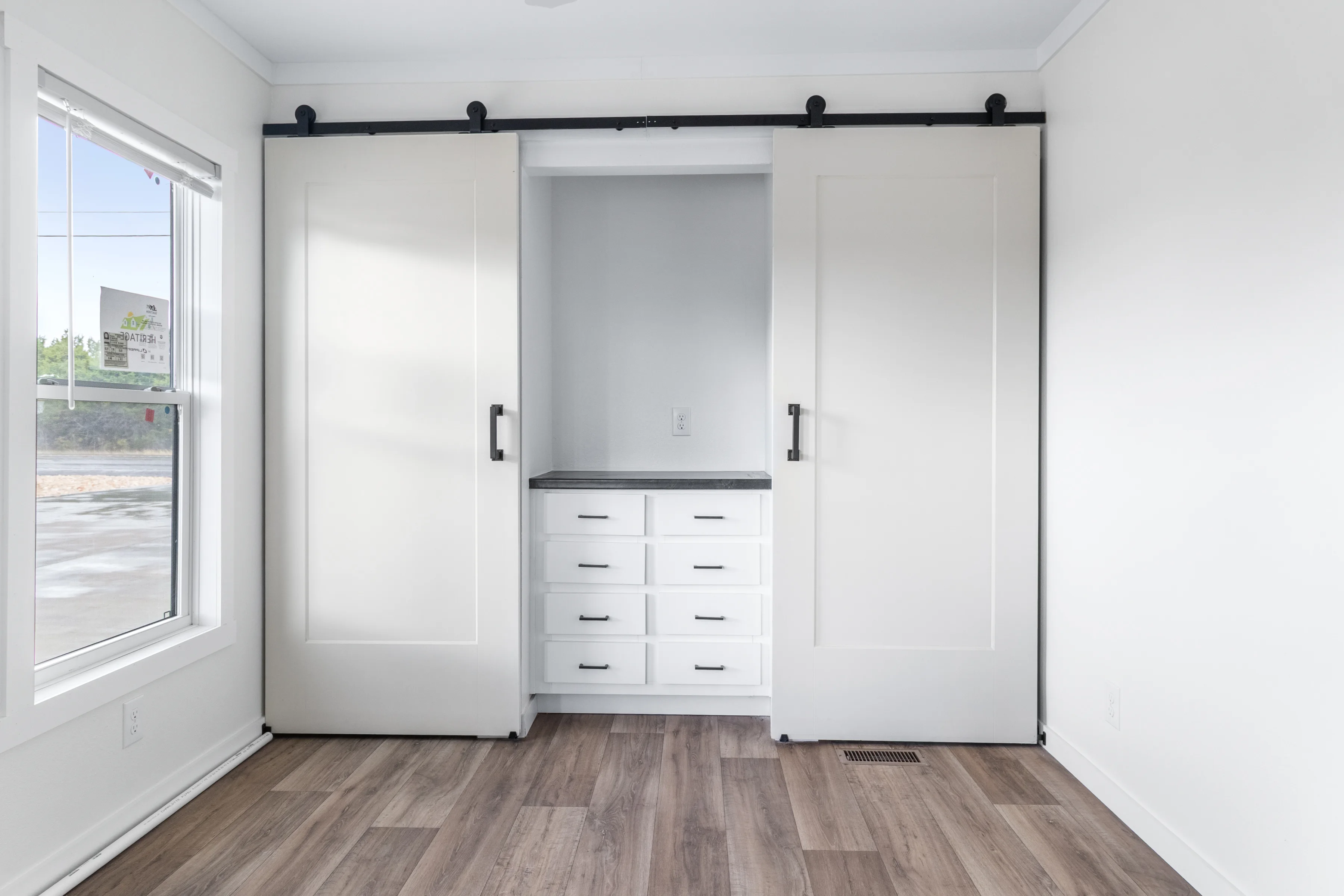 marathon homes direct utility room with built in cabinets breckenridge tx